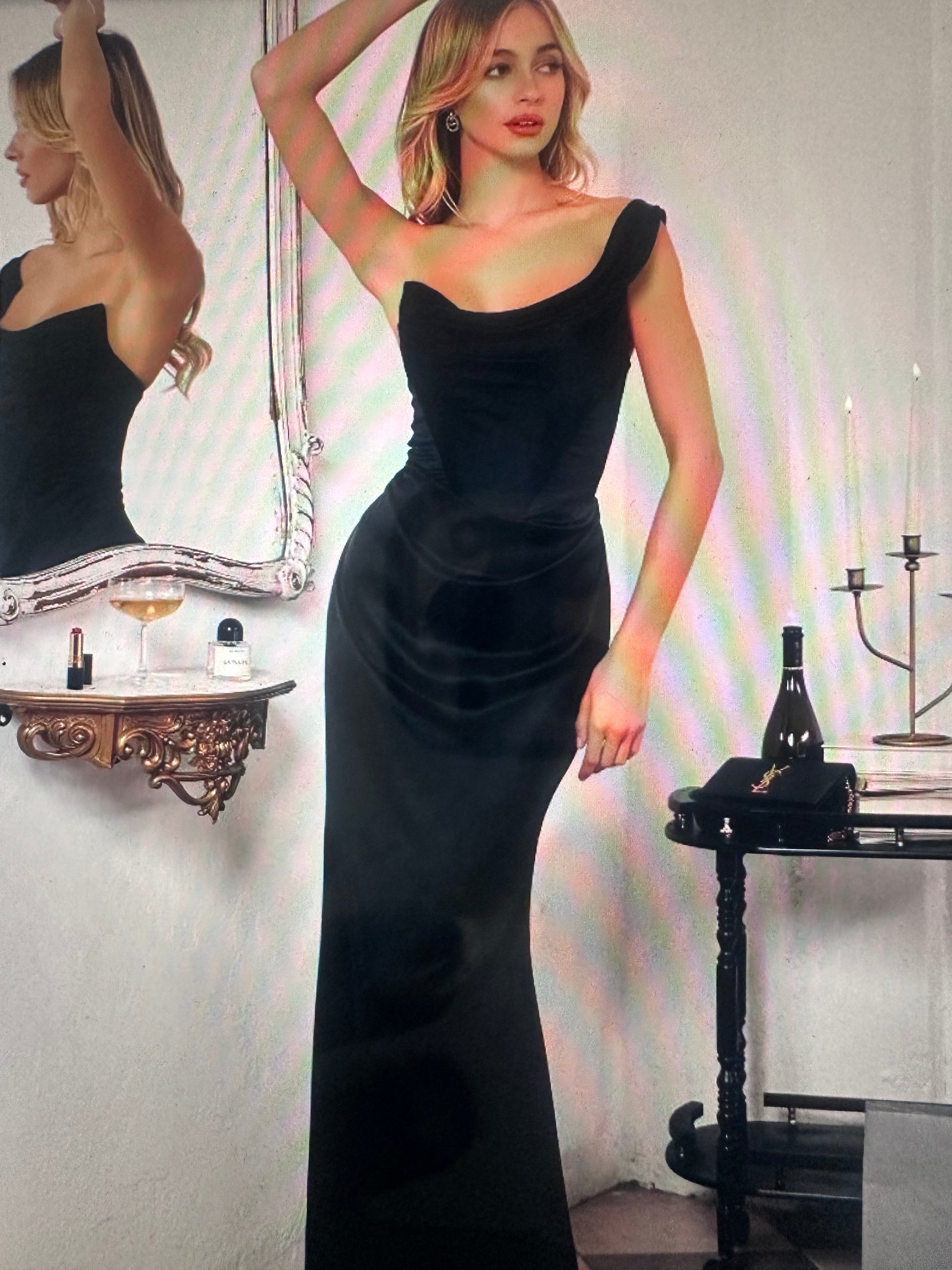 One-shoulder draped neckline with ruched waist detailing