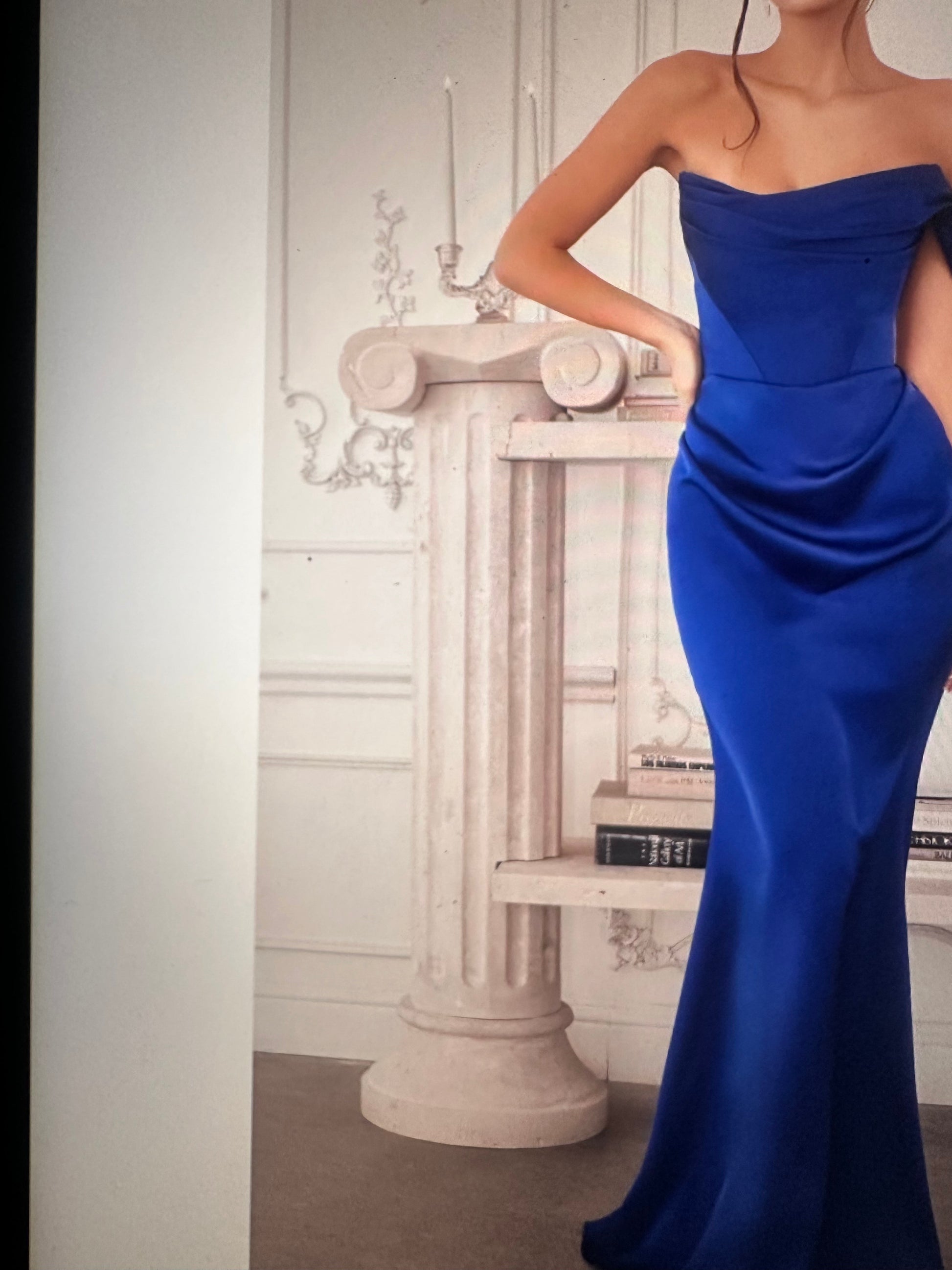 One-shoulder draped neckline with ruched waist detailing