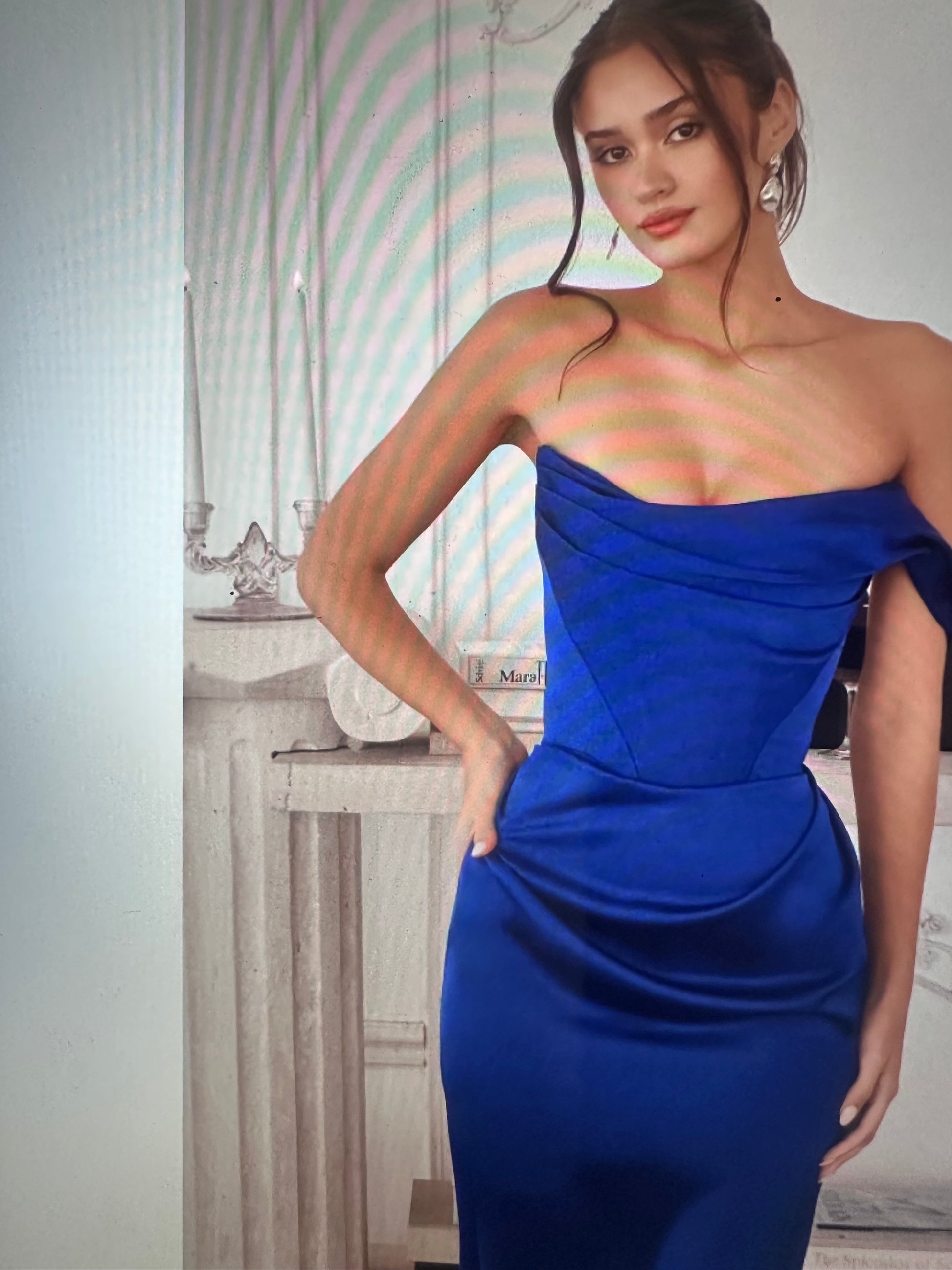 One-shoulder draped neckline with ruched waist detailing