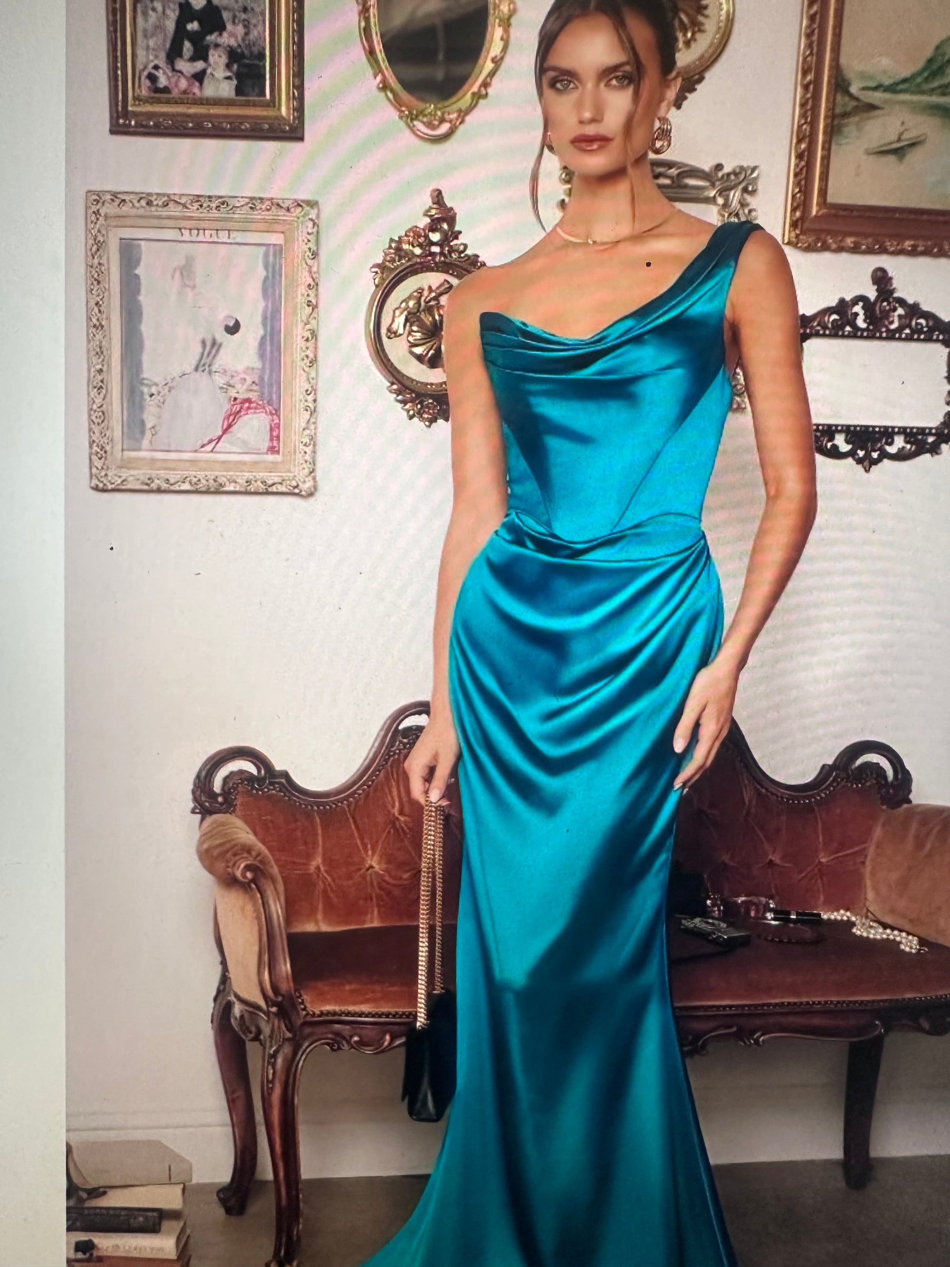 One-shoulder draped neckline with ruched waist detailing