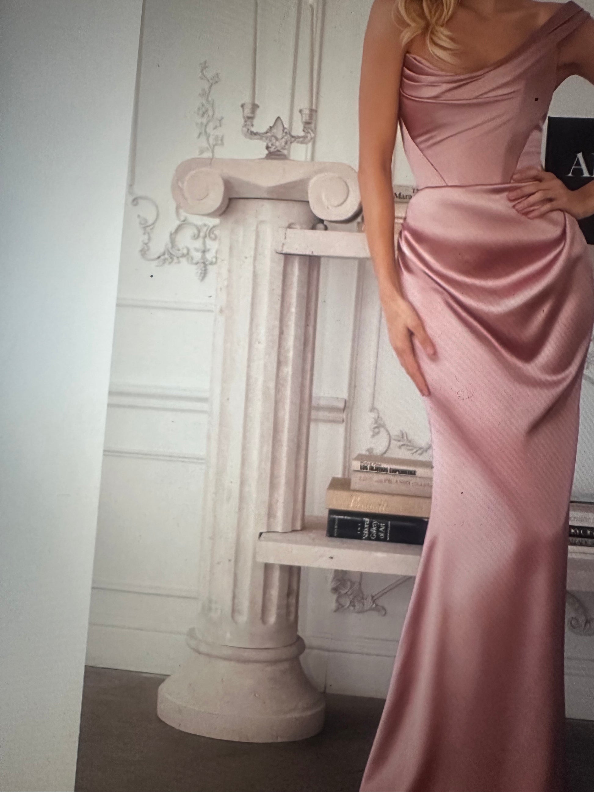 One-shoulder draped neckline with ruched waist detailing